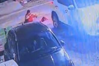 "noida-car-accident-child-crushed-video-viral-critical-condition"