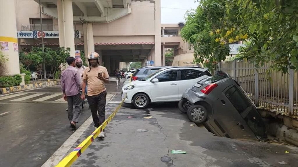 "delhi-rain-rohini-sector-18-road-collapse"