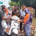 Jhansi: मोठ में भारी बारिश से जलभराव, प्रभावित लोगों को प्रशासन ने वितरित किए भोजन के पैकेट