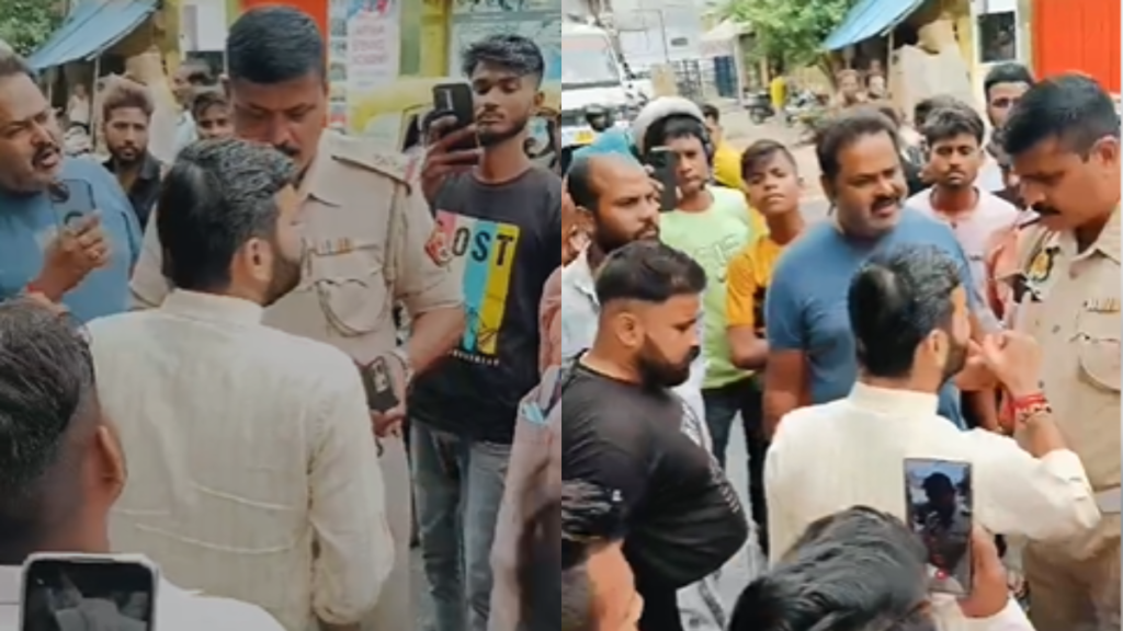 Kanpur: गंगा बैराज चौराहे पर तैनात TSI पर वसूली का आरोप, बजरंग दल कार्यकर्ताओं ने किया हंगामा