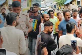 Kanpur: गंगा बैराज चौराहे पर तैनात TSI पर वसूली का आरोप, बजरंग दल कार्यकर्ताओं ने किया हंगामा